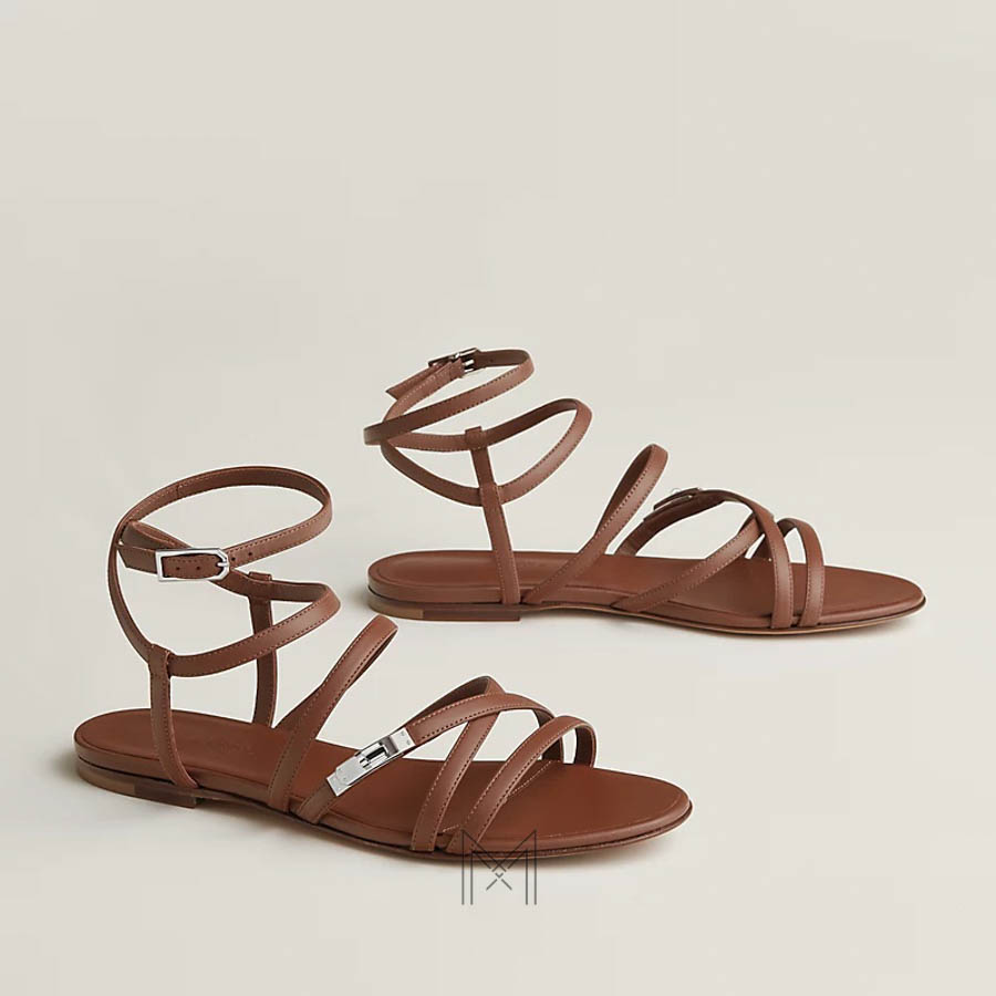 Sandal Hermes Lullaby hàng hiệu chính hãng màu nâu gold MHHH061 2026 Sandal Hermes Lullaby hàng hiệu chính hãng màu nâu gold MHHH061 2026