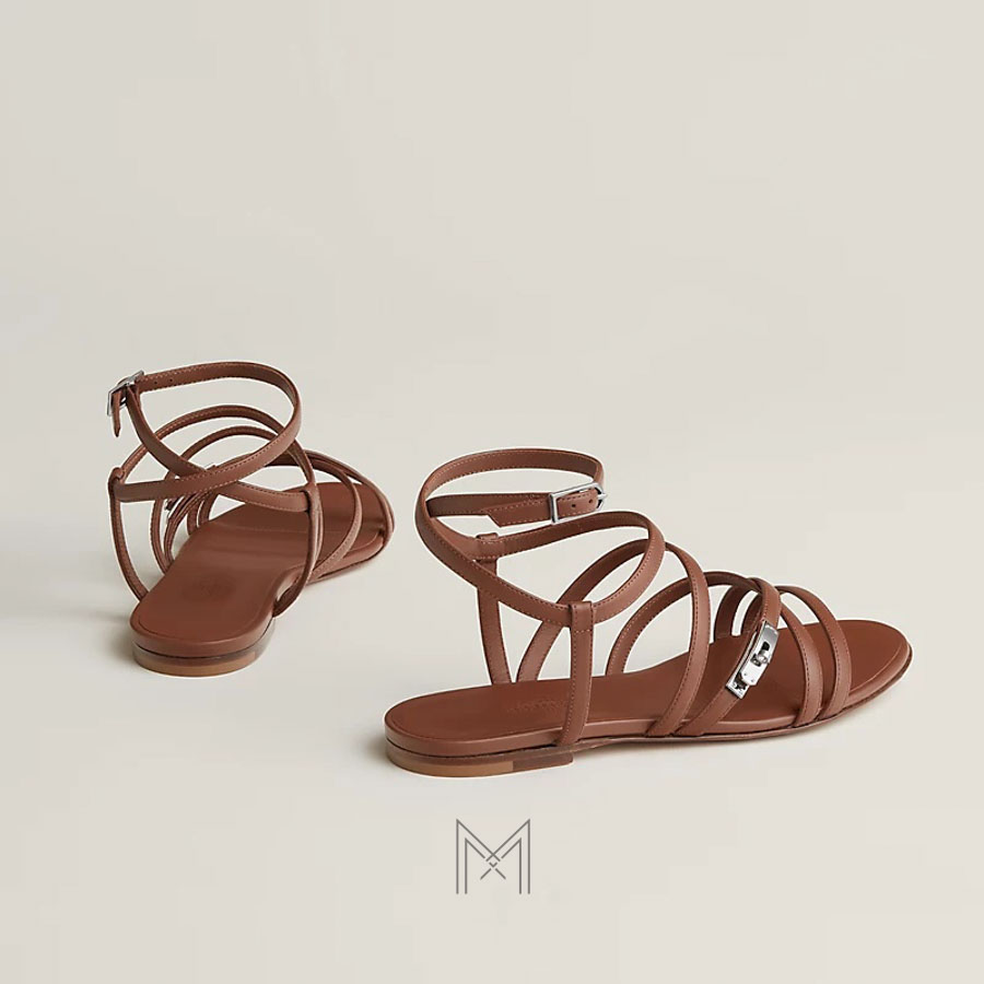 Sandal Hermes Lullaby hàng hiệu chính hãng màu nâu gold MHHH061 2026 Sandal Hermes Lullaby hàng hiệu chính hãng màu nâu gold MHHH061 2026