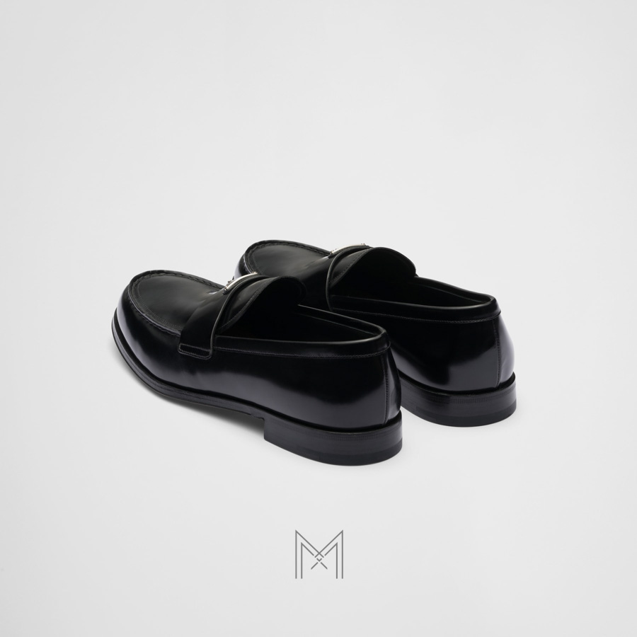 Giày loafer Prada màu đen logo bạc chính hãng NGP001 2026 Giày loafer Prada màu đen logo bạc chính hãng NGP001 2026