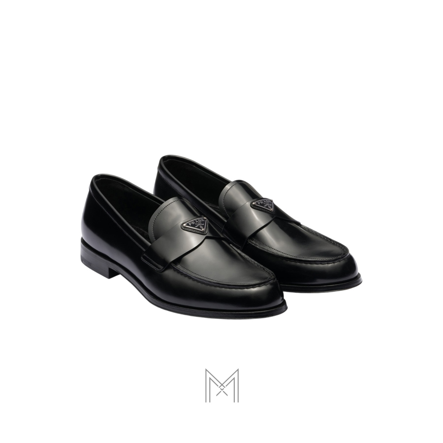 Giày loafer Prada màu đen logo bạc chính hãng NGP001 2026 Giày loafer Prada màu đen logo bạc chính hãng NGP001 2026
