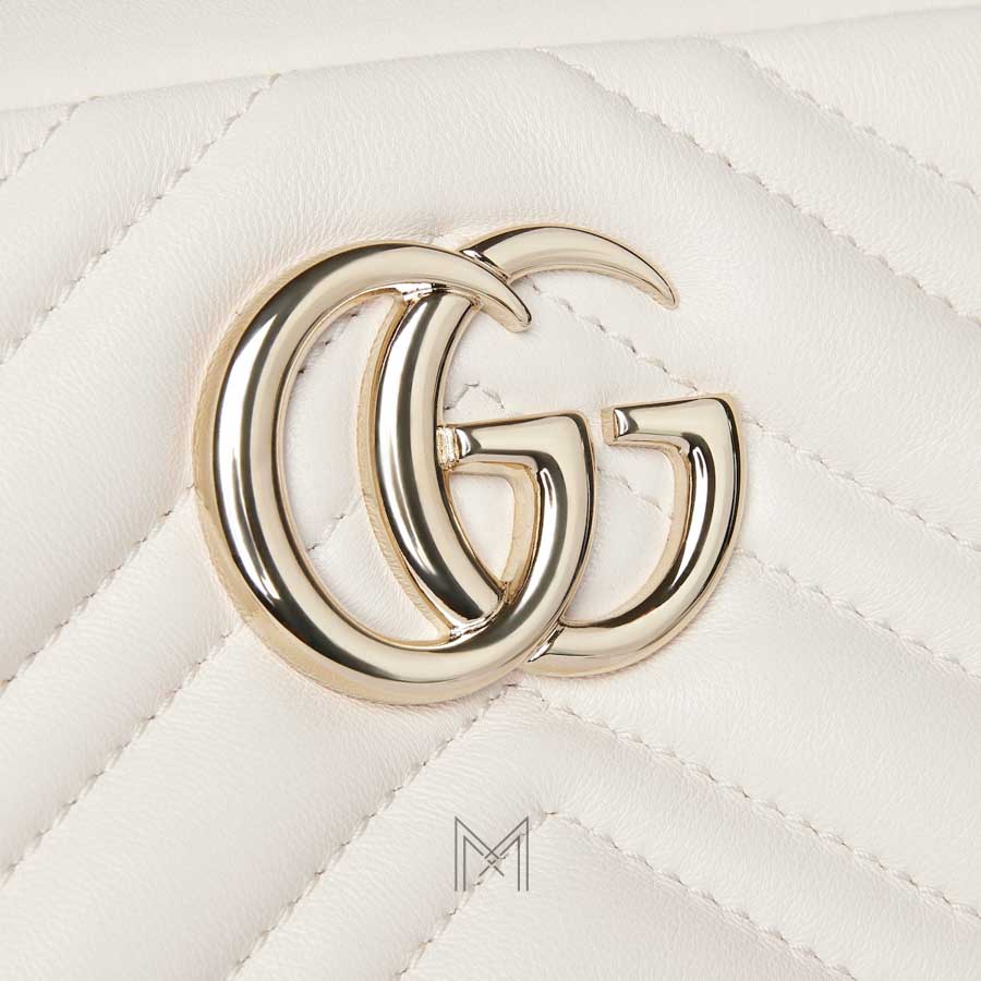 Túi Gucci đeo chéo màu trắng logo bạc chính hãng NTG041 2026 Túi Gucci đeo chéo màu trắng logo bạc chính hãng NTG041 2026