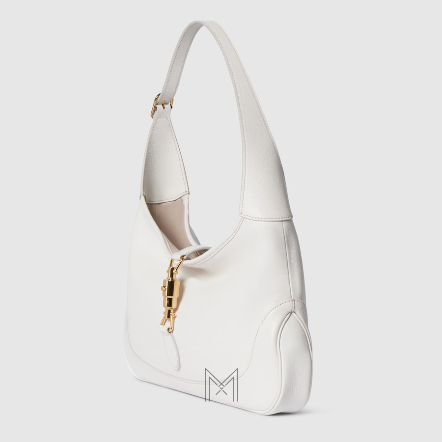 Túi kẹp nách Gucci màu trắng khoá vàng chính hãng NTG039 2026 Túi kẹp nách Gucci màu trắng khoá vàng chính hãng NTG039 2026