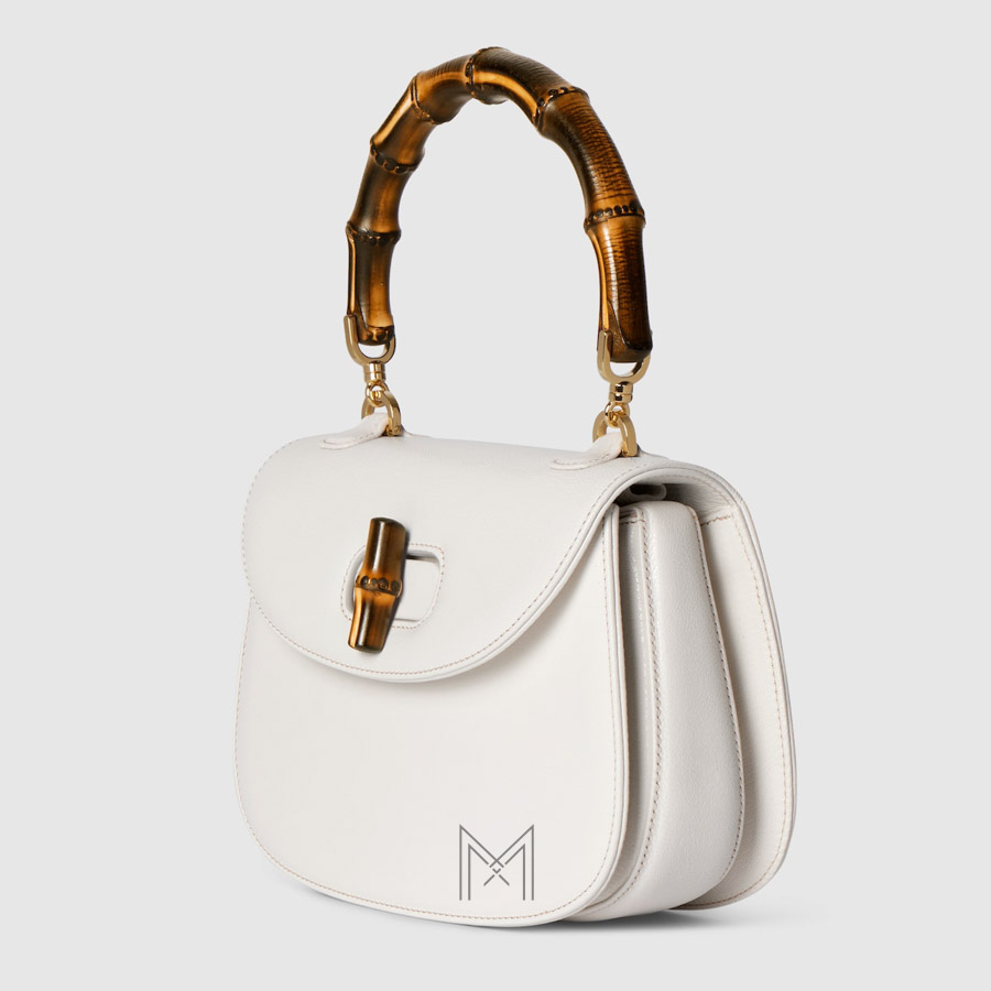 Túi xách đeo chéo Gucci quai gỗ màu trắng authentic NTG017 2026 Túi xách đeo chéo Gucci quai gỗ màu trắng authentic NTG017 2026