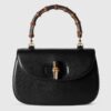 Túi xách đeo chéo Gucci quai trúc màu đen chính hãng NTG016 2026 Túi xách đeo chéo Gucci quai trúc màu đen chính hãng NTG016 2026