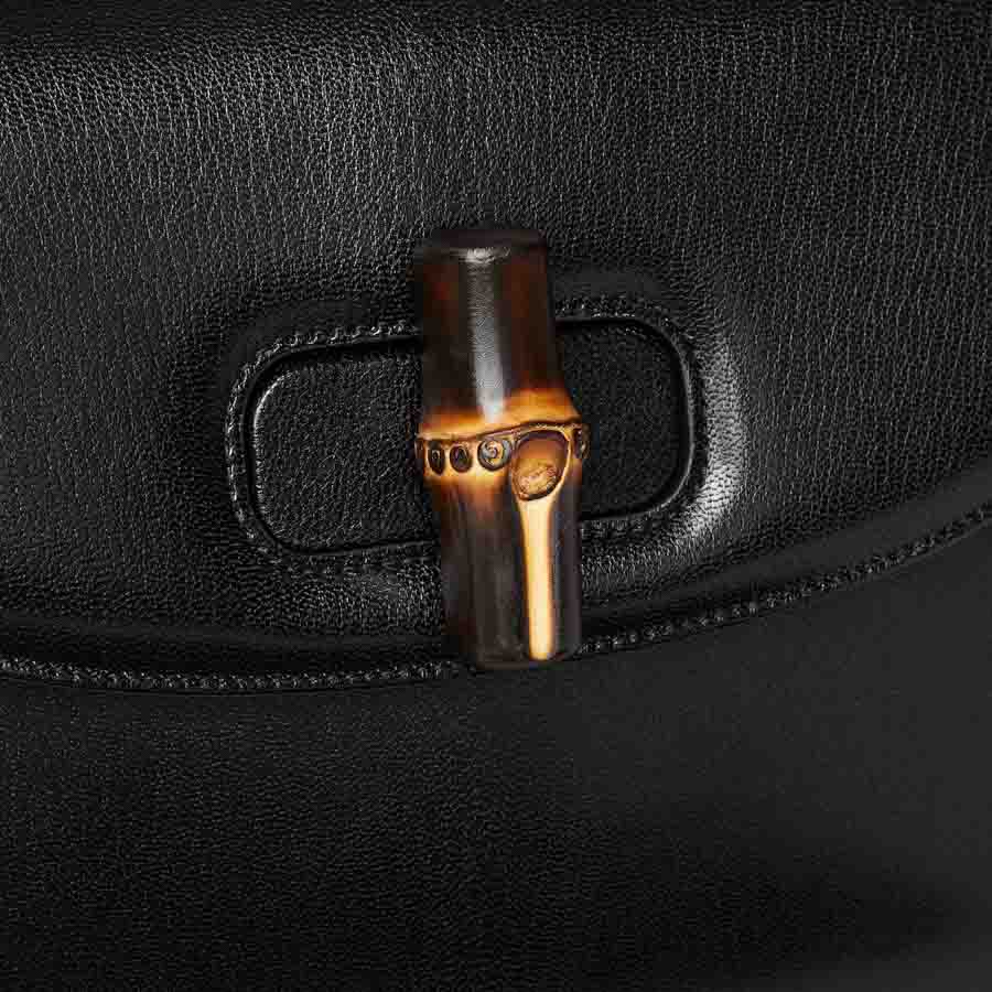 Túi xách đeo chéo Gucci quai trúc màu đen chính hãng NTG016 2026 Túi xách đeo chéo Gucci quai trúc màu đen chính hãng NTG016 2026