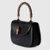 Túi xách đeo chéo Gucci quai trúc màu đen chính hãng NTG016 2026 Túi xách đeo chéo Gucci quai trúc màu đen chính hãng NTG016 2026