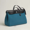 Túi Hermes Herbag Zip màu xanh canvas Militaire & da bò Hunter chính hãng THM10 2026