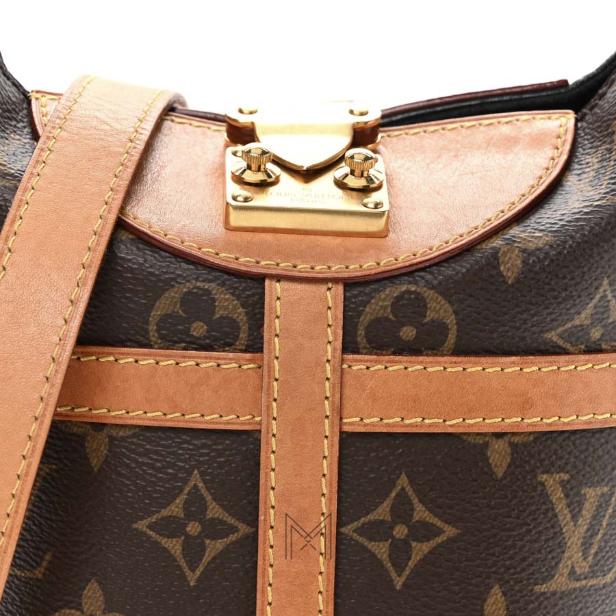 Túi Xách Đeo Chéo LV Dufle Màu Nâu Monogram Phối Da Vachetta LV 393 2026 Túi Xách Đeo Chéo LV Dufle Màu Nâu Monogram Phối Da Vachetta LV 393 2026
