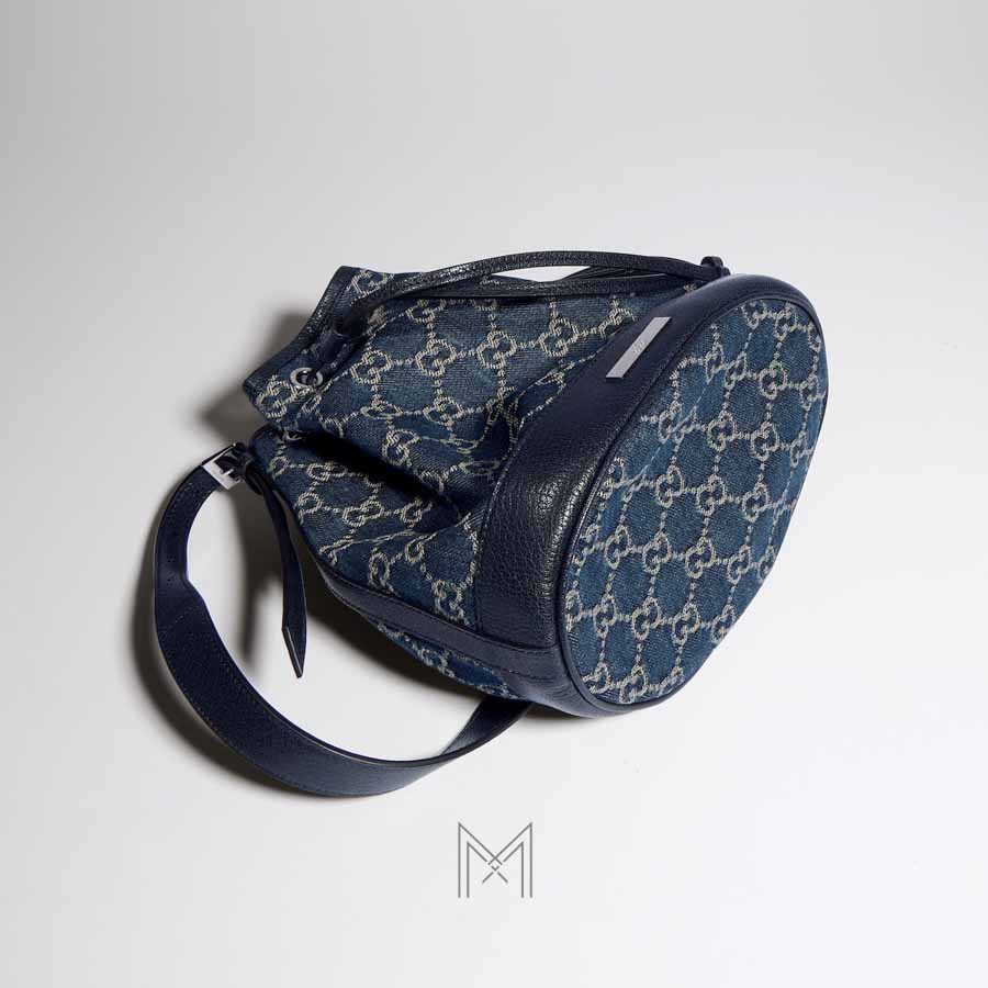 Túi rút Gucci màu xanh demin hoạ tiết GG chính hãng NTG001 2026 Túi rút Gucci màu xanh demin hoạ tiết GG chính hãng NTG001 2026