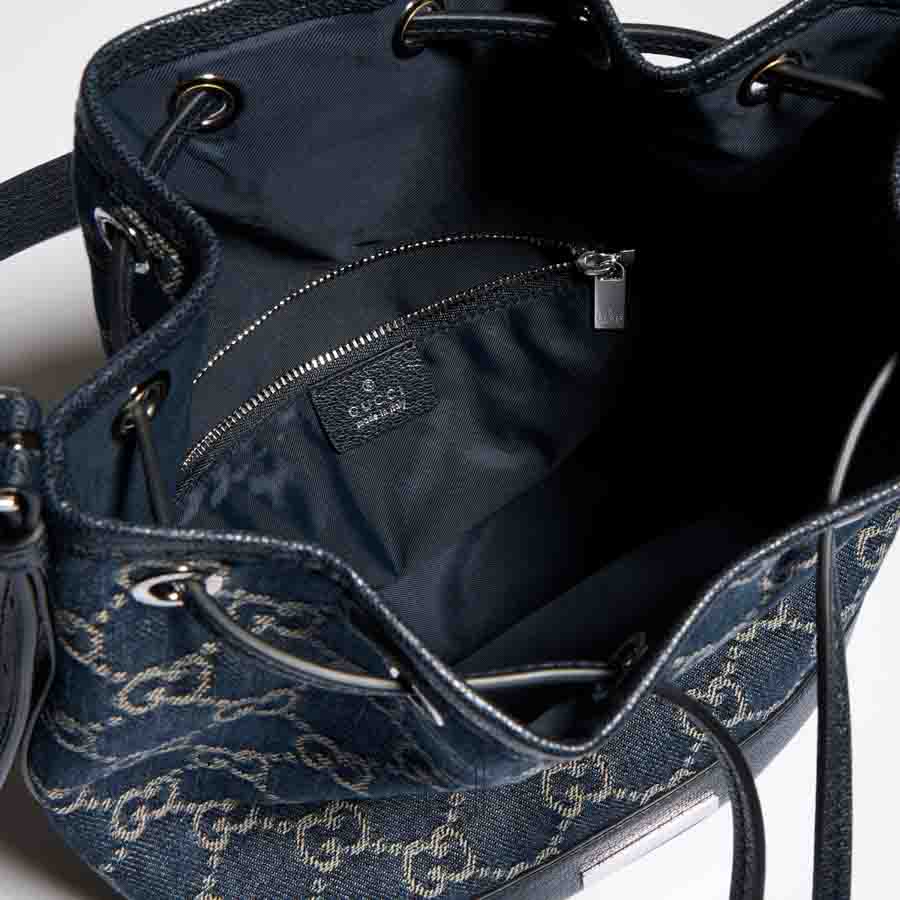 Túi rút Gucci màu xanh demin hoạ tiết GG chính hãng NTG001 2026 Túi rút Gucci màu xanh demin hoạ tiết GG chính hãng NTG001 2026