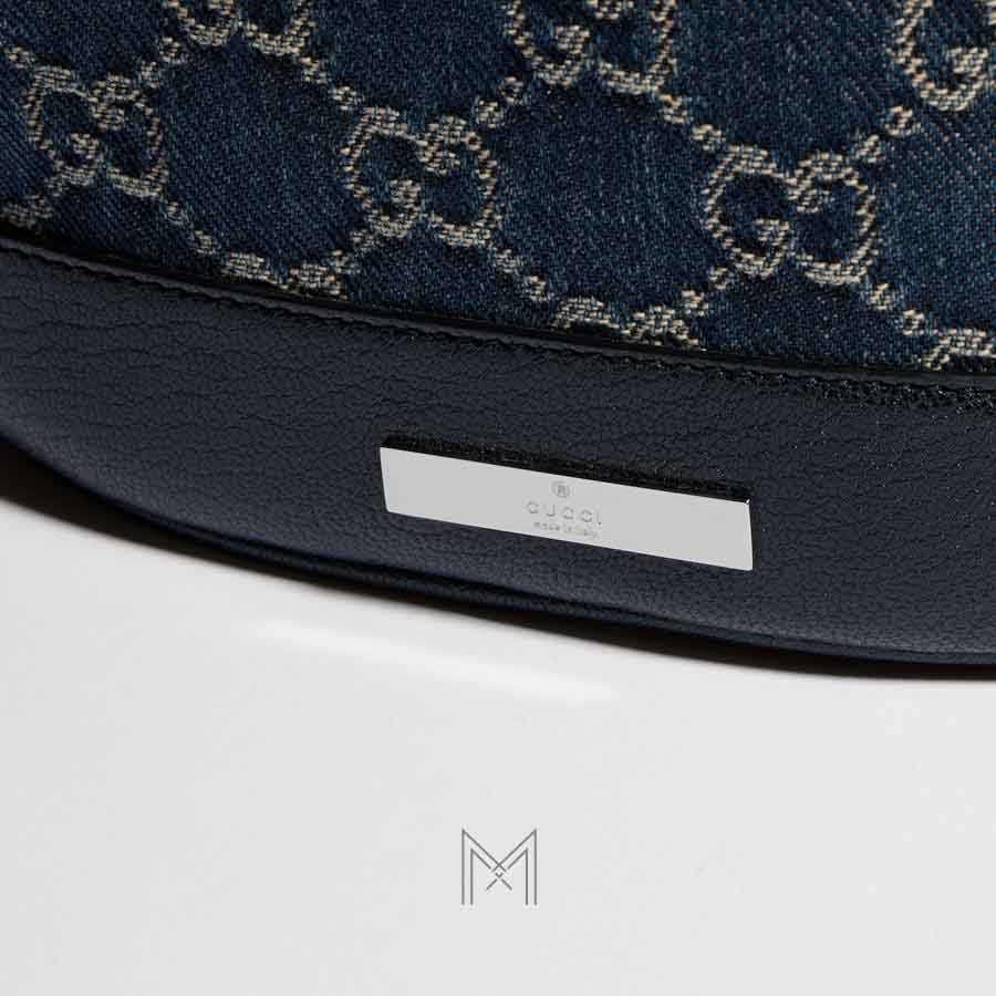 Túi rút Gucci màu xanh demin hoạ tiết GG chính hãng NTG001 2026 Túi rút Gucci màu xanh demin hoạ tiết GG chính hãng NTG001 2026