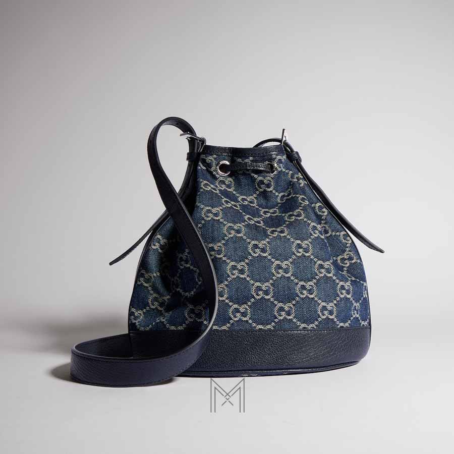 Túi rút Gucci màu xanh demin hoạ tiết GG chính hãng NTG001 2026 Túi rút Gucci màu xanh demin hoạ tiết GG chính hãng NTG001 2026