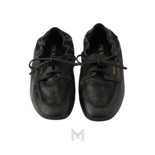 Giày đế bệt Prada Shuffle Antiqued Leather màu đen chính hãng MHNP111