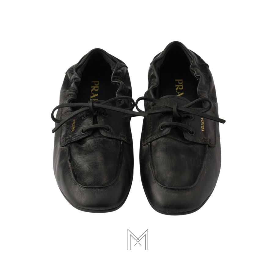 Giày đế bệt Prada Shuffle Antiqued Leather màu đen chính hãng MHNP111 2026 Giày đế bệt Prada Shuffle Antiqued Leather màu đen chính hãng MHNP111 2026