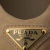 Giày búp bê Prada da lộn màu be logo vàng chính hãng MHNP098 2026
